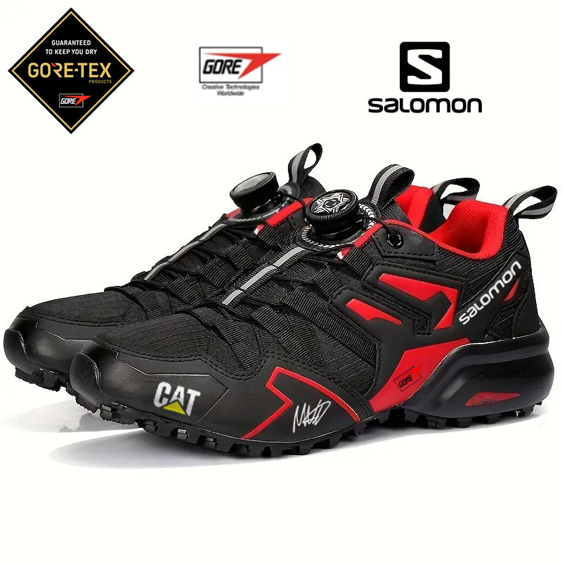 Vízálló GTX túracipő CAT és Salomon márkától, kényelmes és kopásálló (limitált kiadás F1-es pilóta aláírásával)