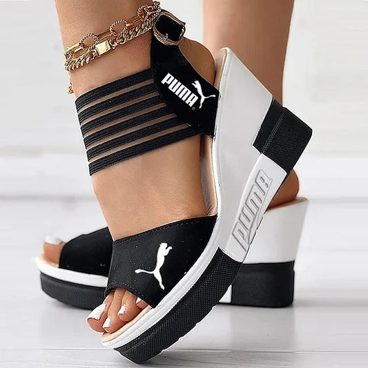 WEBHELYEM  Puma 2025 Wedge Platform női szandálok