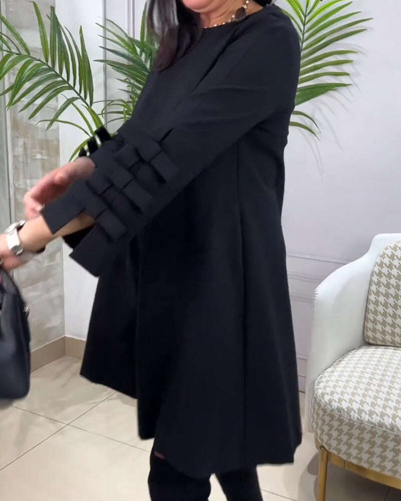 Lezser térdig érő ruha hosszú ujjal